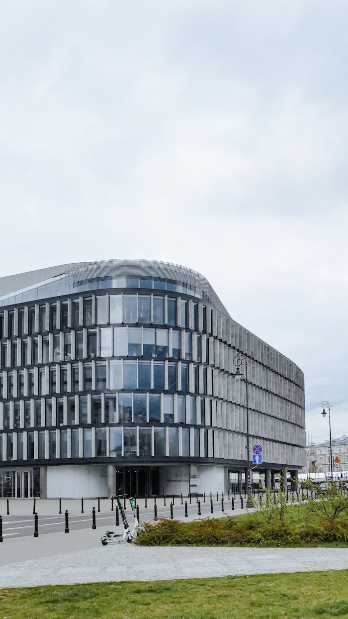 Contemporary building design in Warszawa, showcasing sleek modern architecture in an urban setting.